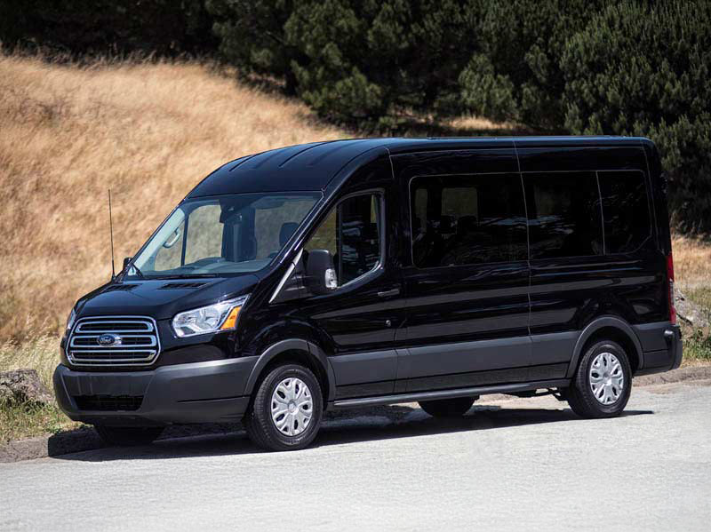 Ford Transit touring van parked at a scenic pullout