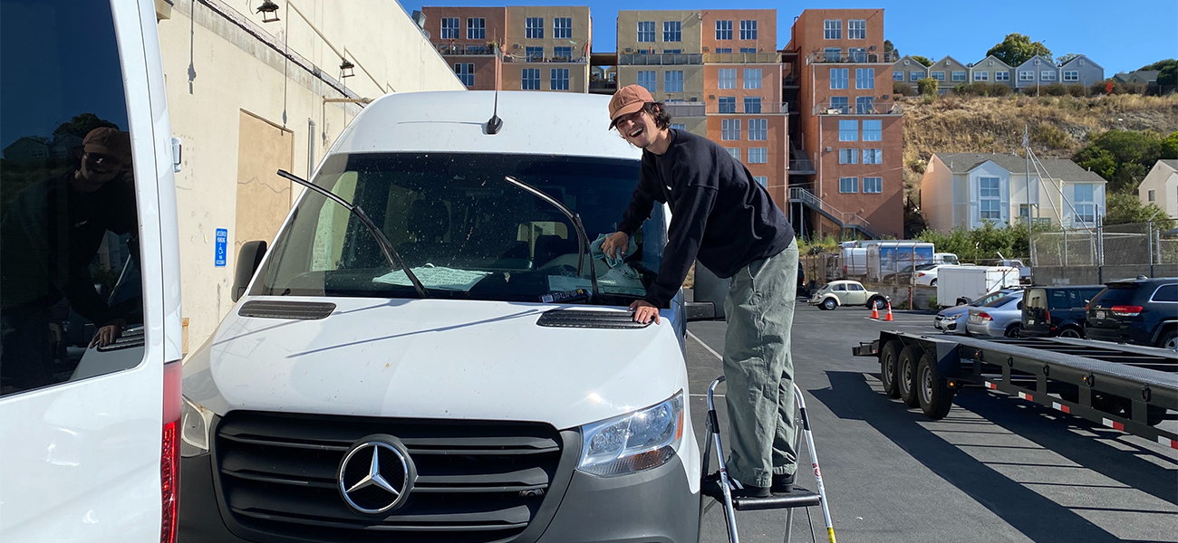 A Bandago crew member prepping a Sprinter van